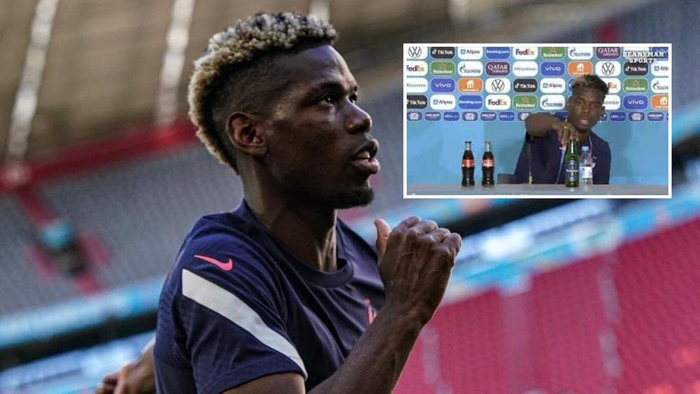 بوغبا يزيل "قنينة خمر" في المؤتمر الصحفي الخاص بمباراة ألمانيا وفرنسا ويقول: "الكل يرشحنا للقب لكن علينا التحلي بالتواضع"