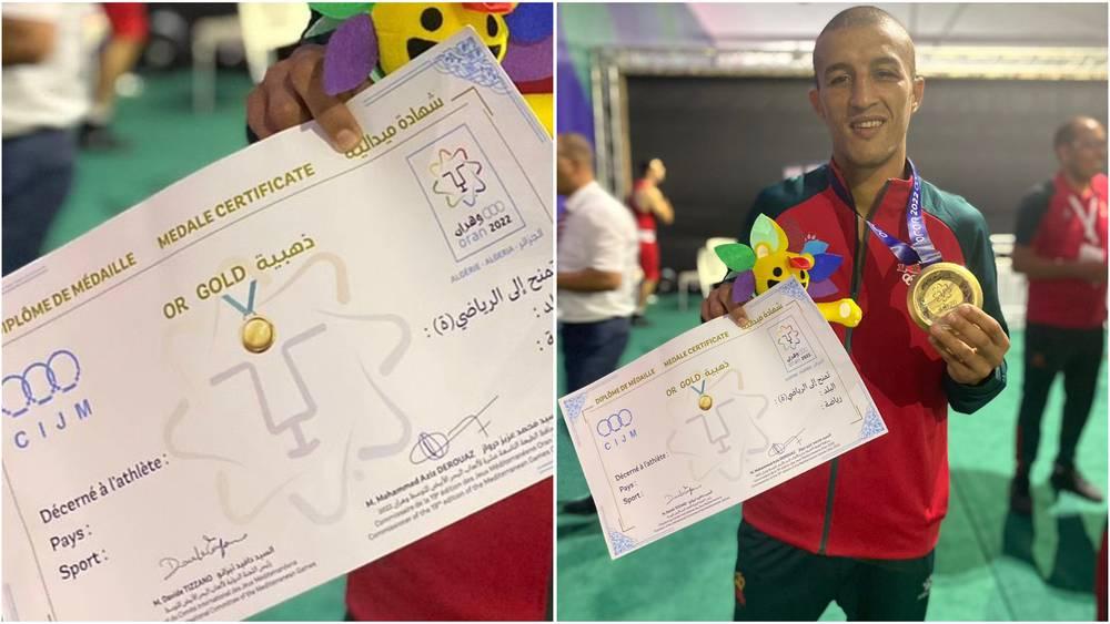 الملاكم المغربي محمد حموت يستلم "شهادة فارغة" بعد تتويجه بالذهب في الألعاب المتوسطية بوهران